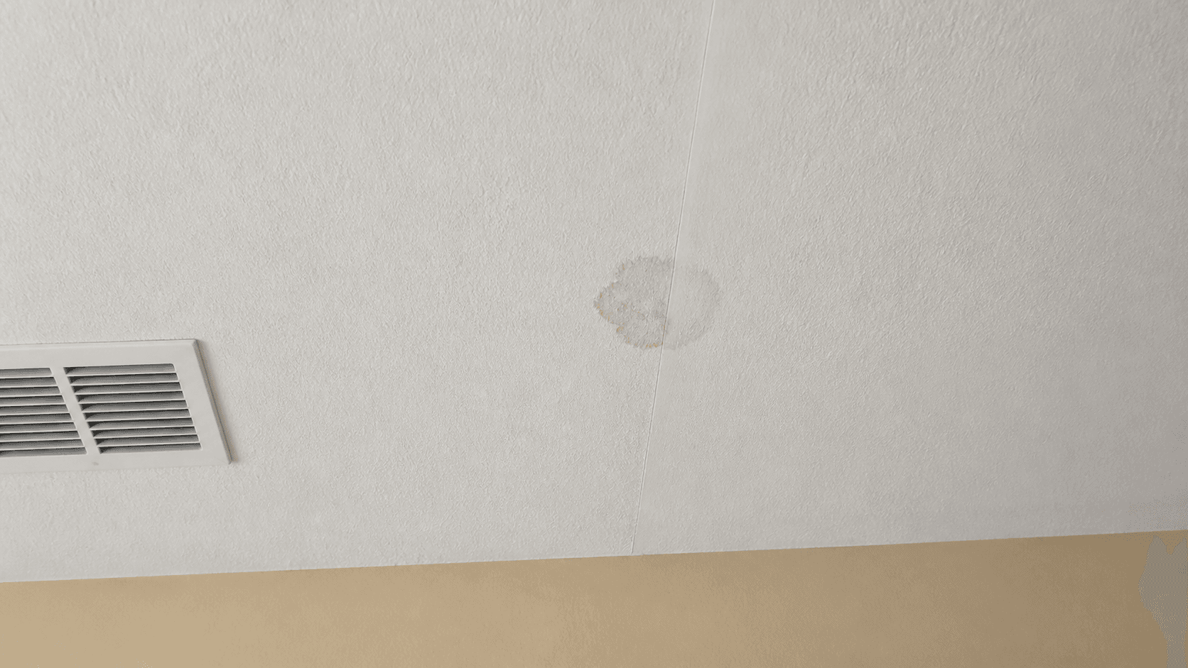 Illustrative small ceiling water stain